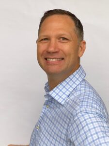 Headshot of Kannar CEO Sam Cloete bridging agricultural silos